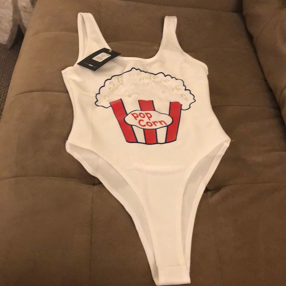 Cute white body suit